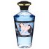 Shunga - šildantis masažo aliejus su kokosais (100ml) 